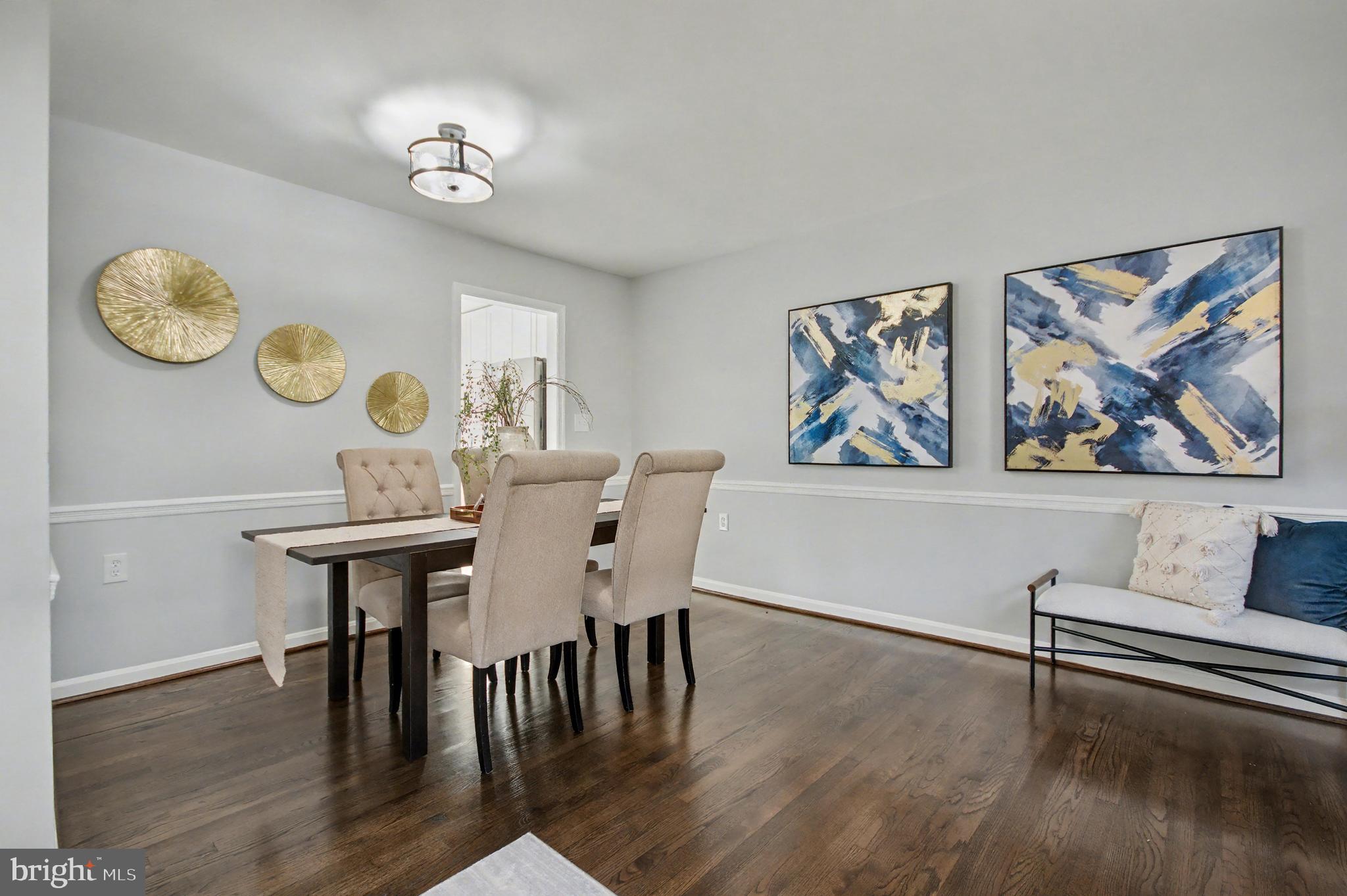 1729 Dana Street, Unit 6 Crofton, MD 21114 - Photo 14 of 33 a view of a dining room with furniture and wooden floor