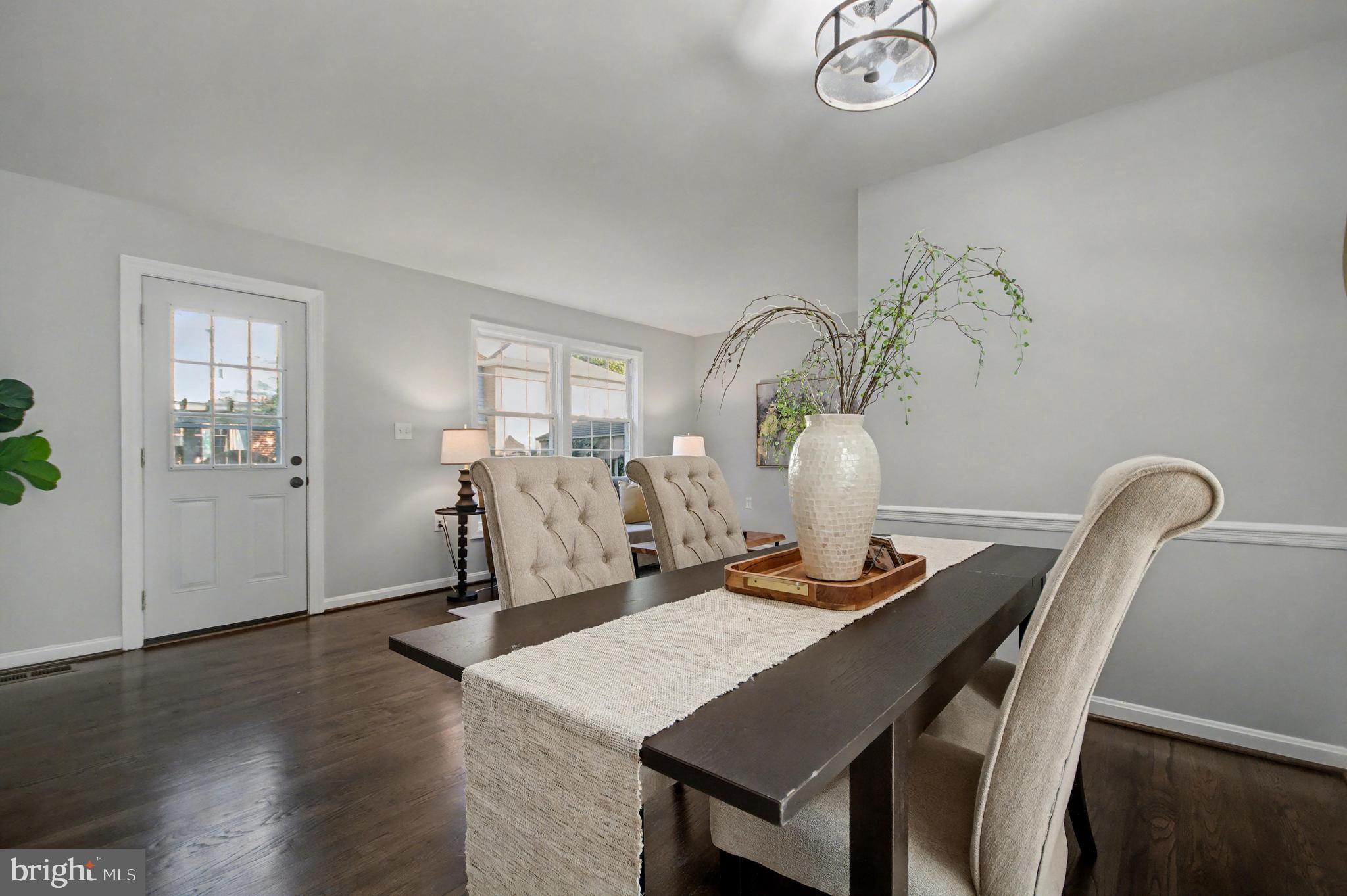 1729 Dana Street, Unit 6 Crofton, MD 21114 - Photo 15 of 33 a view of a dining room with furniture and wooden floor