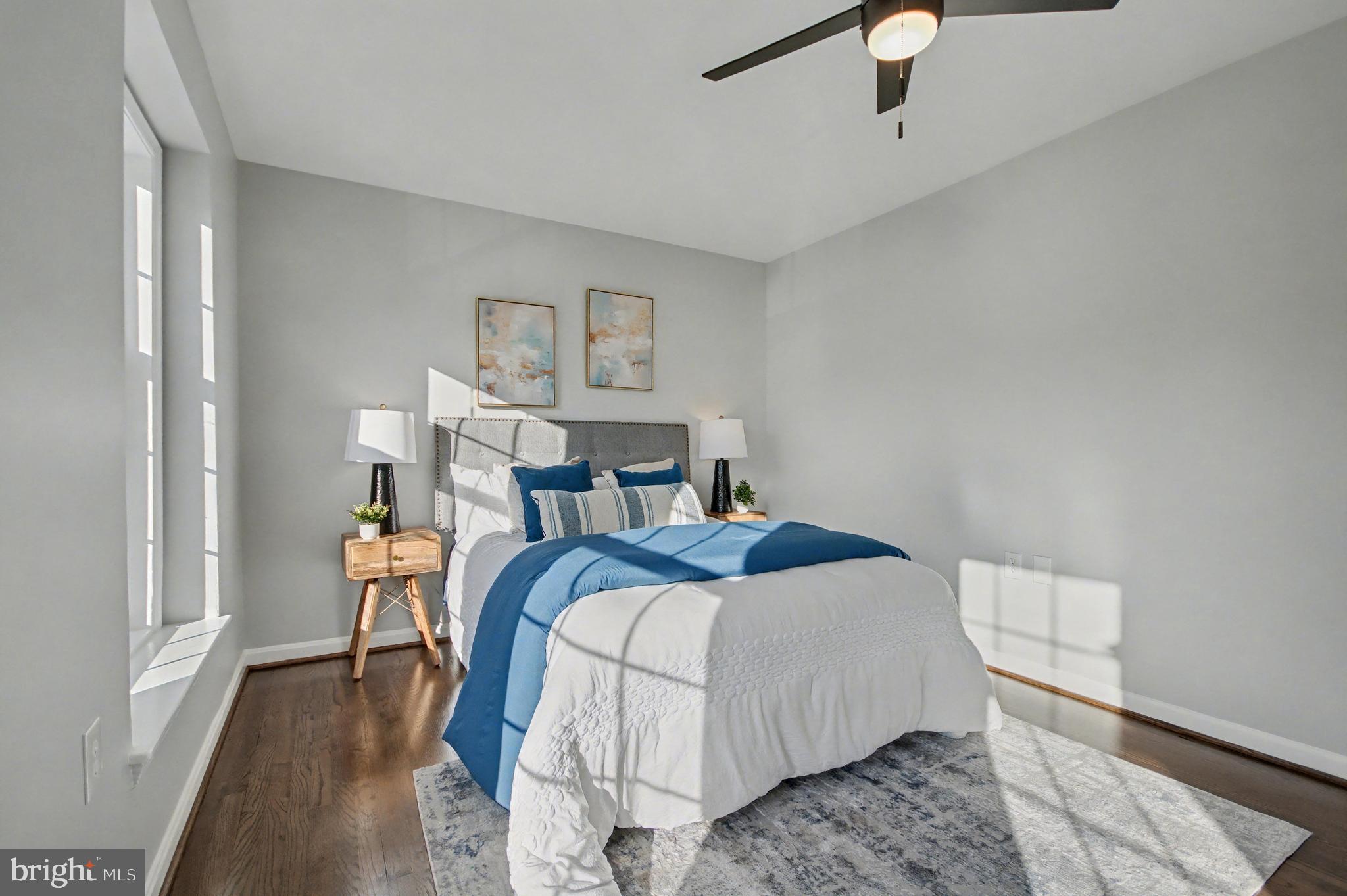 1729 Dana Street, Unit 6 Crofton, MD 21114 - Photo 20 of 33 a bedroom with a bed and a painting on the wall