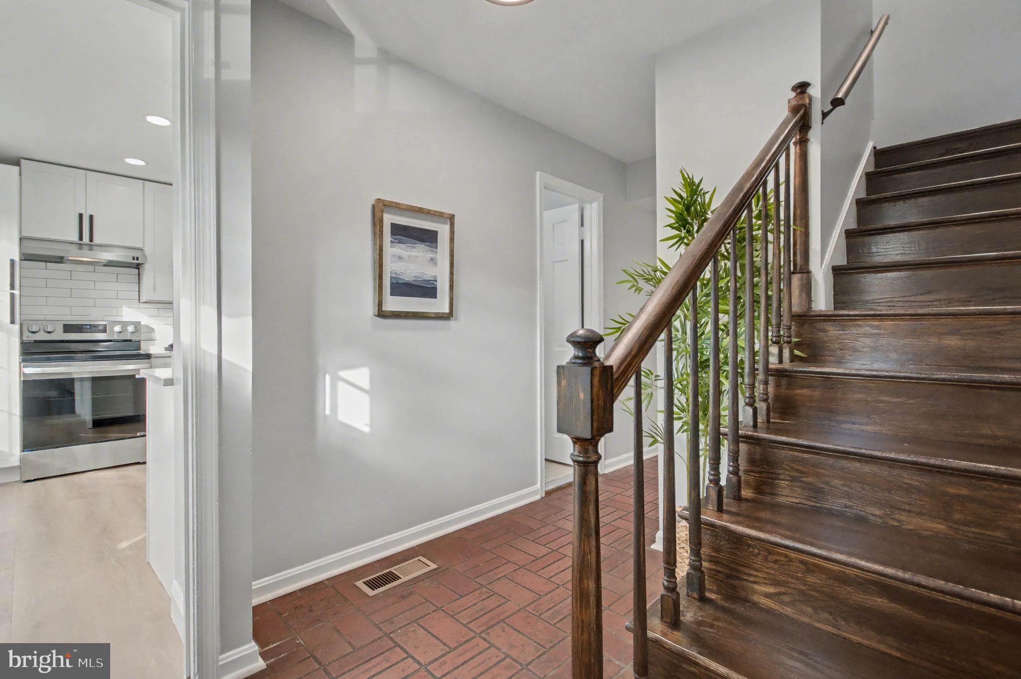 1729 Dana Street, Unit 6 Crofton, MD 21114 - Photo 3 of 33 a view of entryway and hall with wooden floor