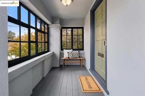 a view of room with furniture and window