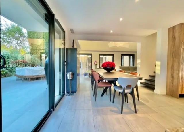 1 Rue Rolland Garros Aix Liverpool, England 13090 - Photo 16 of 31 a view of a dining room with furniture window and outside view