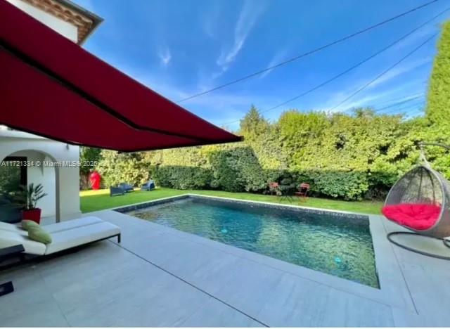 1 Rue Rolland Garros Aix Liverpool, England 13090 - Photo 2 of 31 a view of backyard with swimming pool and outdoor seating