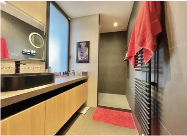 1 Rue Rolland Garros Aix Liverpool, England 13090 - Photo 21 of 31 a bathroom with a sink and a mirror