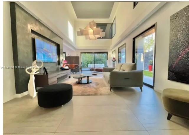1 Rue Rolland Garros Aix Liverpool, England 13090 - Photo 7 of 31 a living room with furniture and a large window