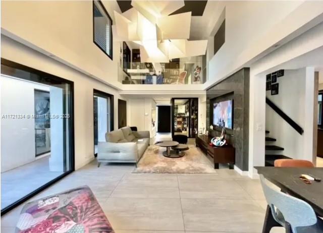 1 Rue Rolland Garros Aix Liverpool, England 13090 - Photo 10 of 31 a very nice looking room with a large window and chandelier