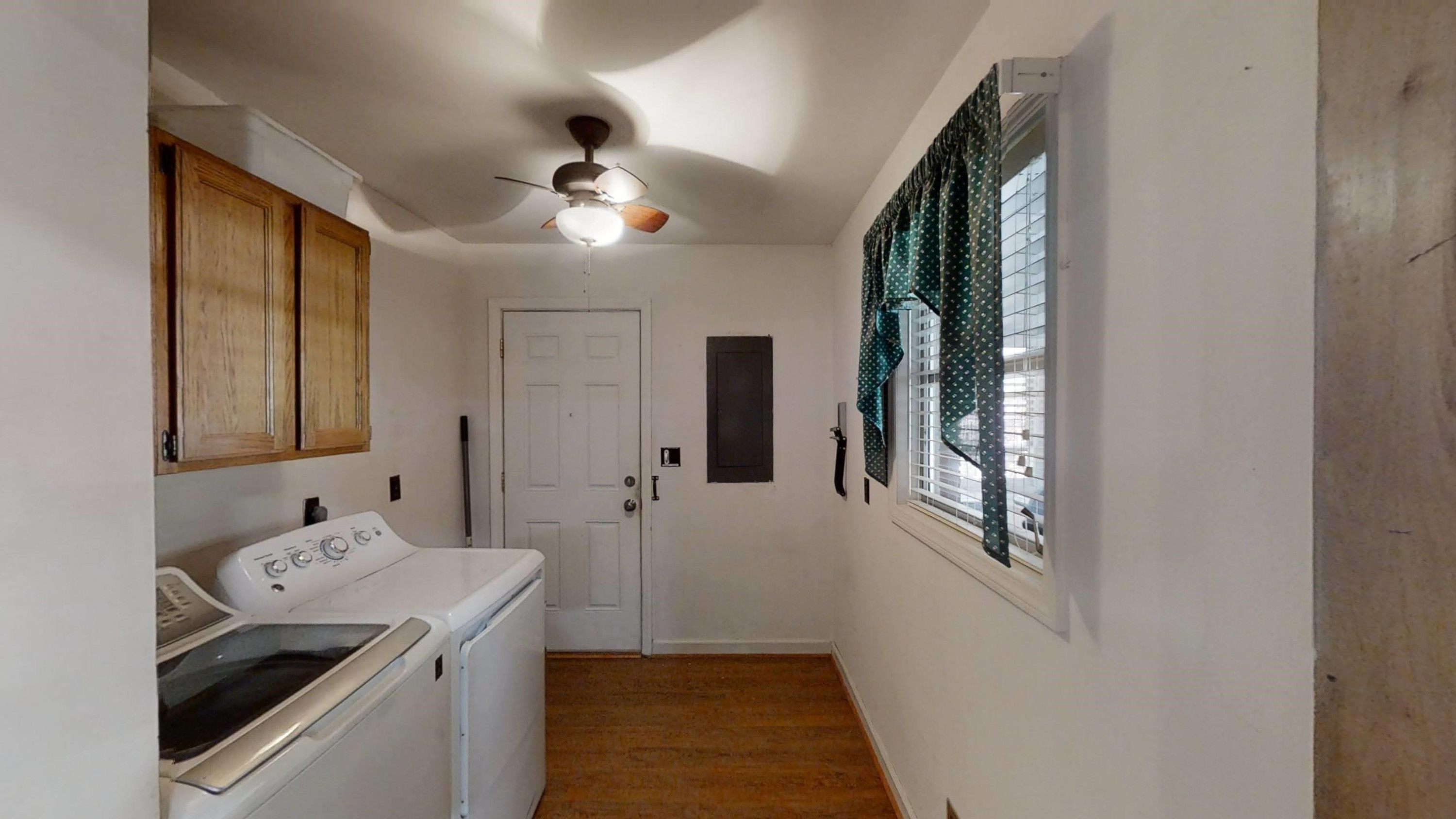 1115 Perry Road Zebulon, NC 27597 - Photo 27 of 37 a bathroom with a sink a vanity and a mirror