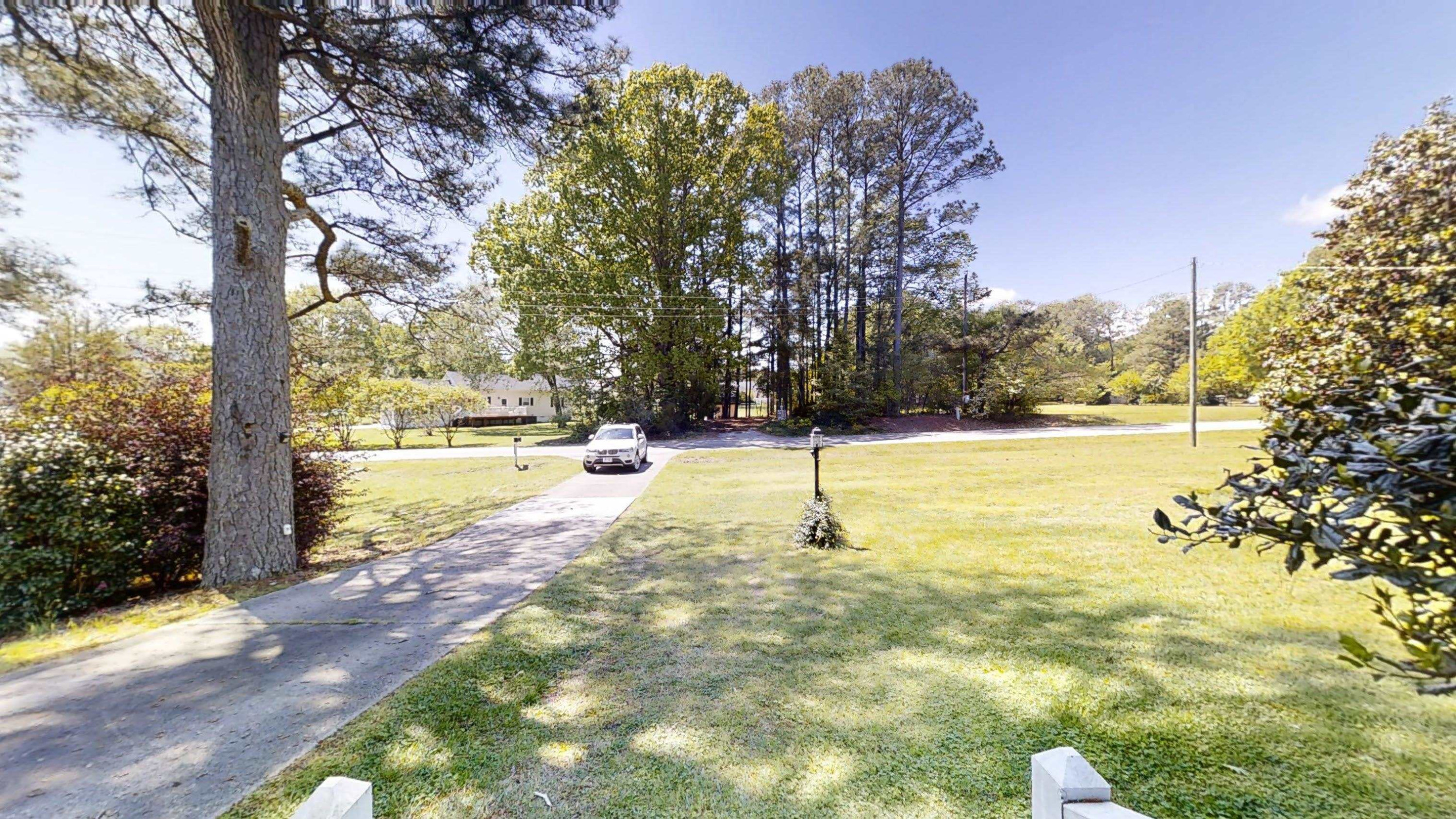 1115 Perry Road Zebulon, NC 27597 - Photo 29 of 37 a view of a swimming pool with an outdoor space and seating area
