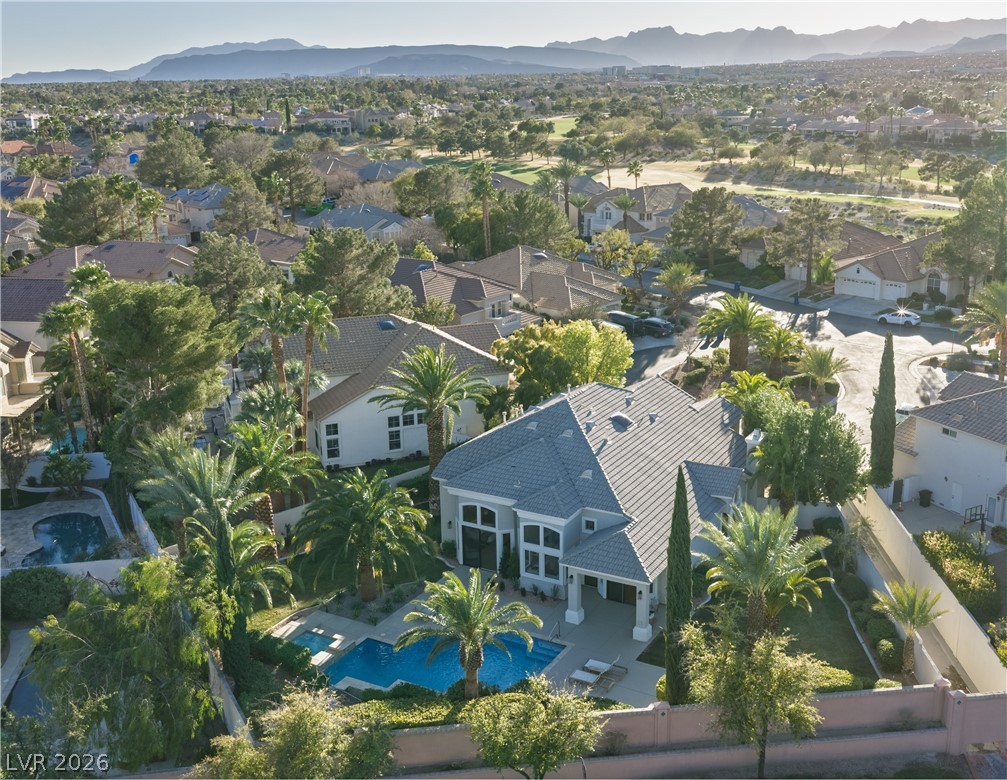 8800 Lusso Las Vegas, NV 89134 - Photo 13 of 85 Aerial perspective of suburban area featuring a mountain backdrop