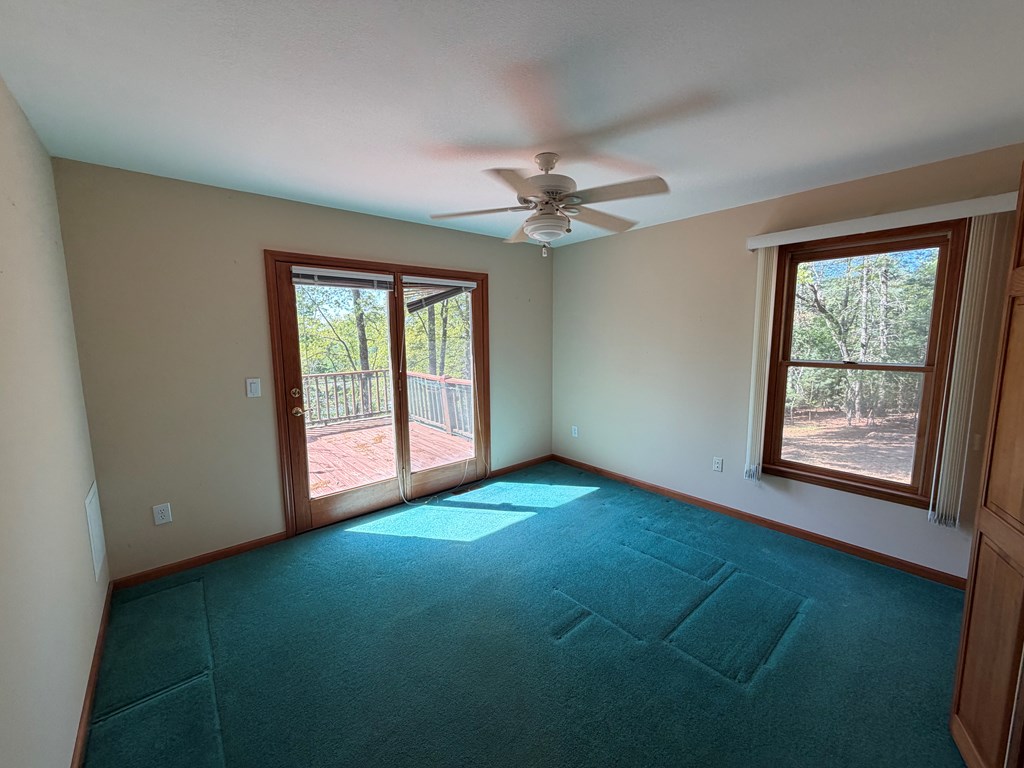78 Timber Ridge Lane Hayesville, NC 28904 - Photo 19 of 43 a view of an empty room with a window