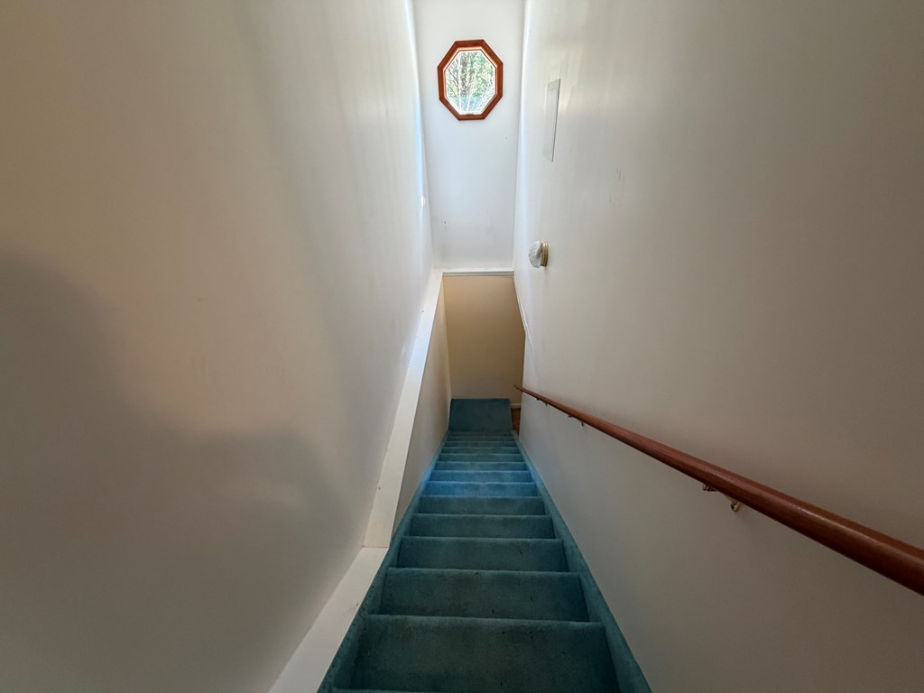 78 Timber Ridge Lane Hayesville, NC 28904 - Photo 22 of 43 a view of a hallway with wooden floor