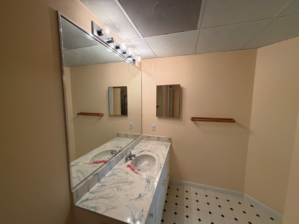 78 Timber Ridge Lane Hayesville, NC 28904 - Photo 27 of 43 a bathroom with a sink and a mirror