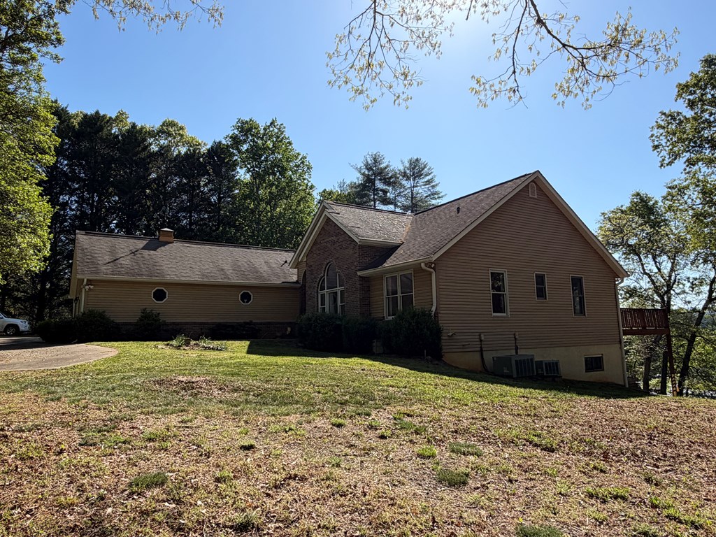 78 Timber Ridge Lane Hayesville, NC 28904 - Photo 3 of 43 a house with a yard