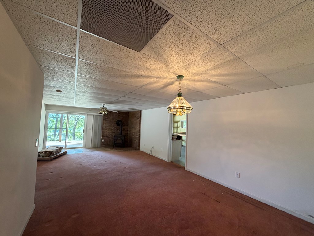 78 Timber Ridge Lane Hayesville, NC 28904 - Photo 34 of 43 a view of a room with window and chandelier