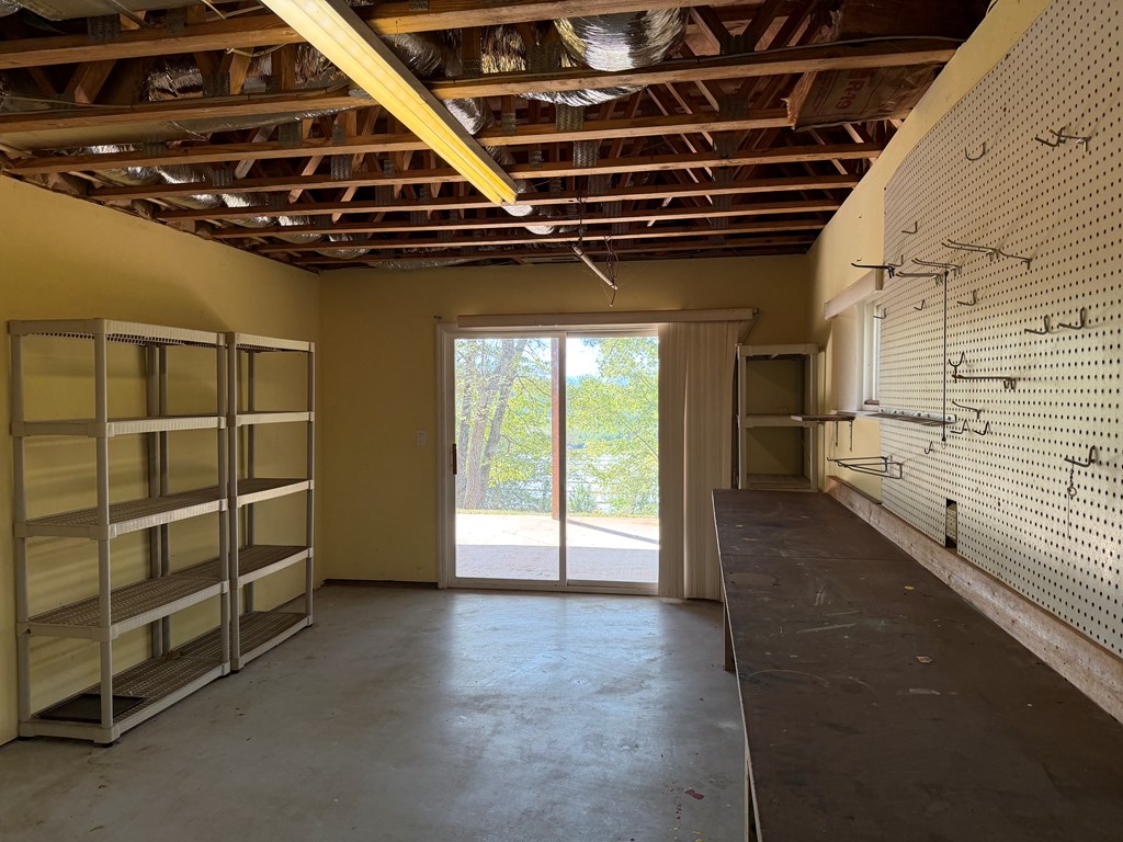78 Timber Ridge Lane Hayesville, NC 28904 - Photo 36 of 43 a view of an empty room with a staircase