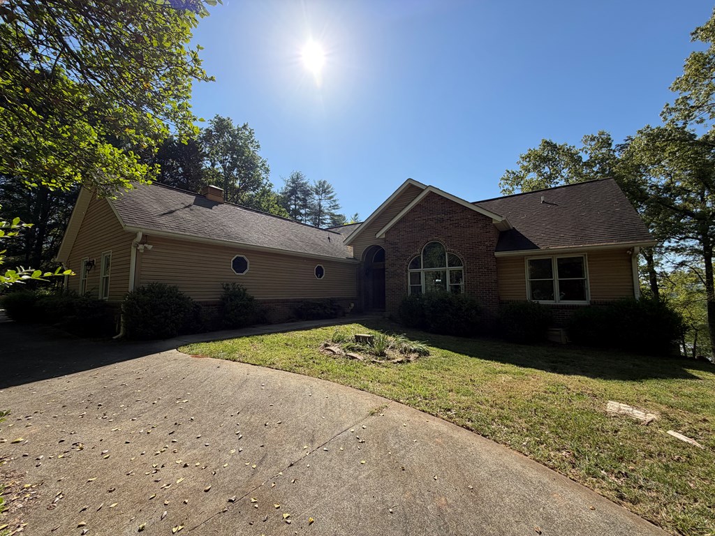78 Timber Ridge Lane Hayesville, NC 28904 - Photo 4 of 43 a front view of a house with a yard