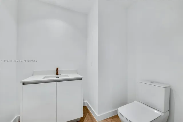 a bathroom with a sink and a toilet