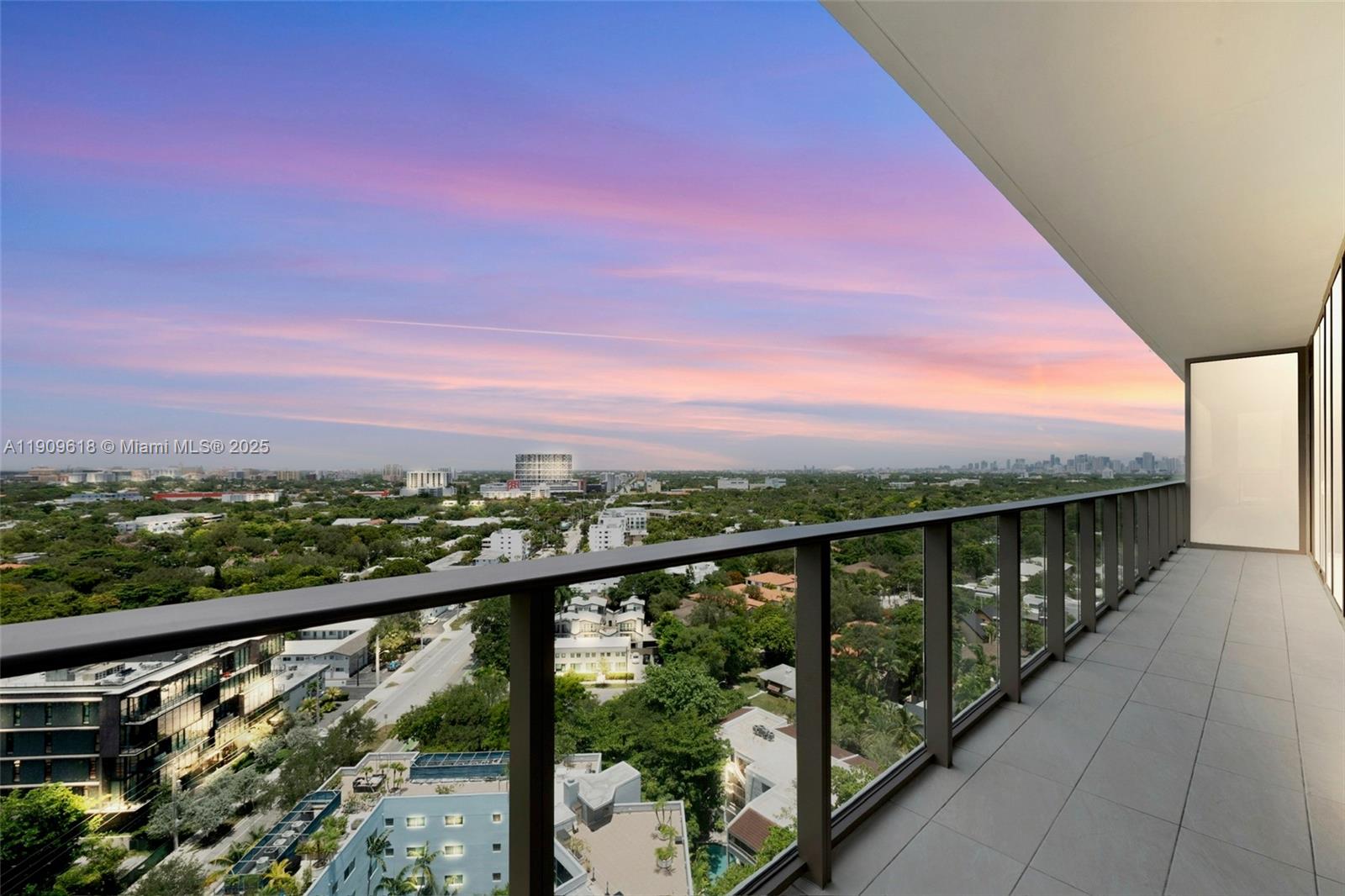 2678 Tigertail Avenue, Unit 1501 Miami, FL 33133 - Photo 19 of 44 a view of city and mountain from a balcony