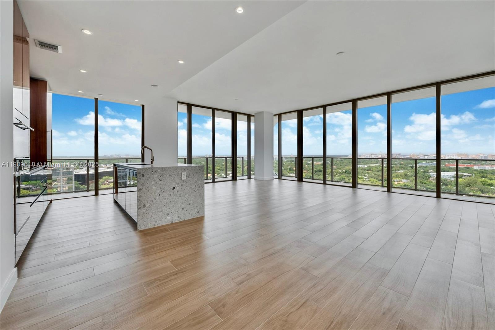 2678 Tigertail Avenue, Unit 1501 Miami, FL 33133 - Photo 2 of 44 a view of an entryway with wooden floor