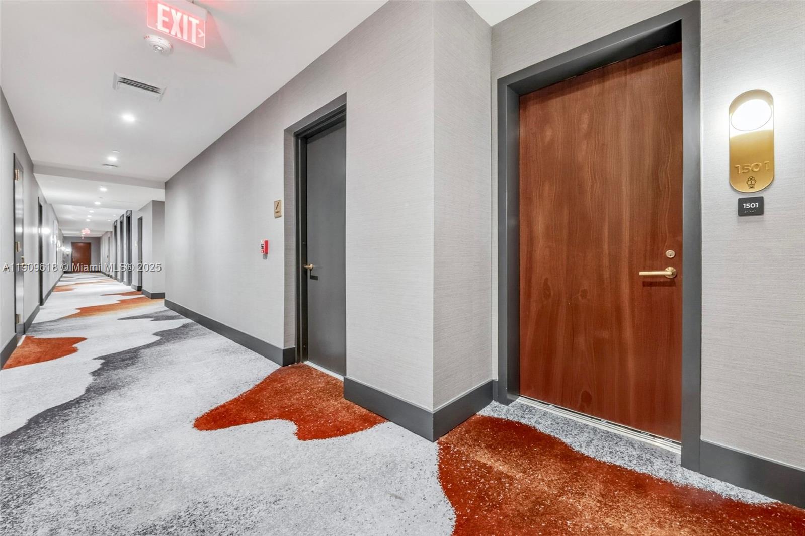 2678 Tigertail Avenue, Unit 1501 Miami, FL 33133 - Photo 36 of 44 a bedroom with a bed and a painting on the wall