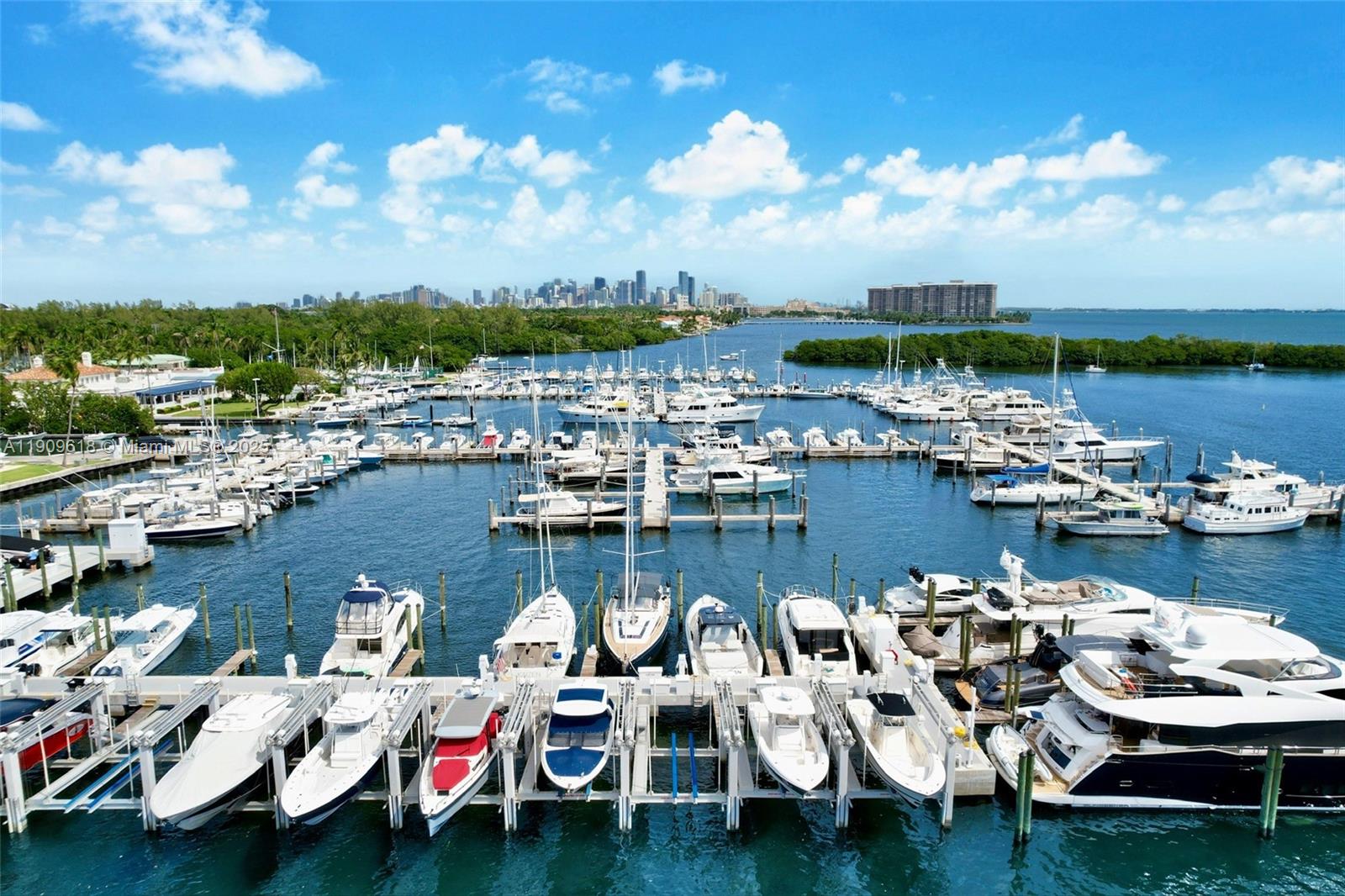 2678 Tigertail Avenue, Unit 1501 Miami, FL 33133 - Photo 39 of 44 a view of a lake with boats in it