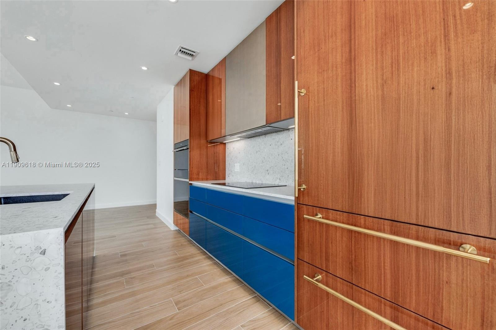 2678 Tigertail Avenue, Unit 1501 Miami, FL 33133 - Photo 4 of 44 a view of kitchen with natural light