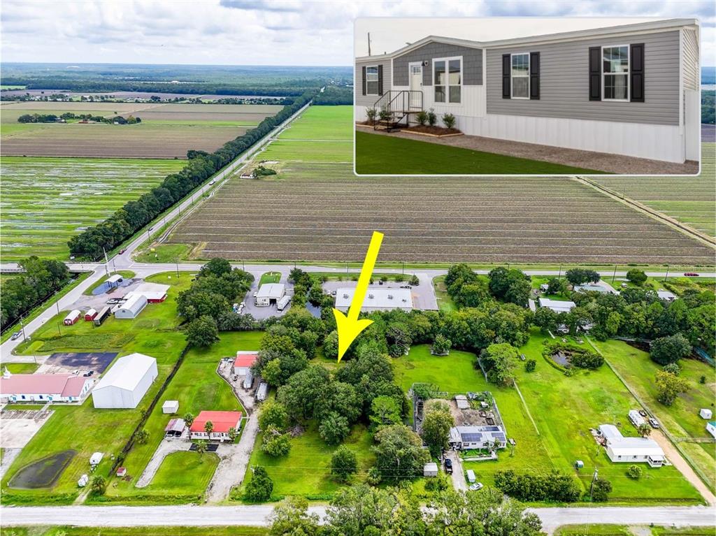 1089 Aspen Street Bunnell, FL 32110 - Photo 1 of 15 a view of building with swimming pool