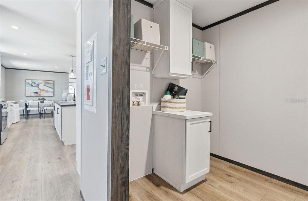 1089 Aspen Street Bunnell, FL 32110 - Photo 12 of 15 a view of hallway with wooden floor