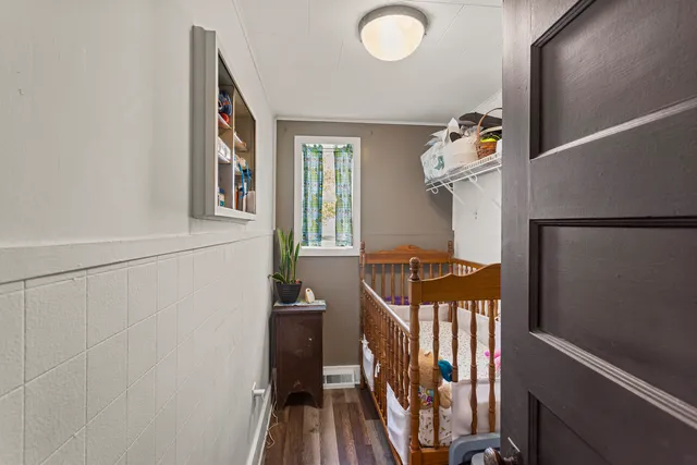 a view of front door and deck of the house