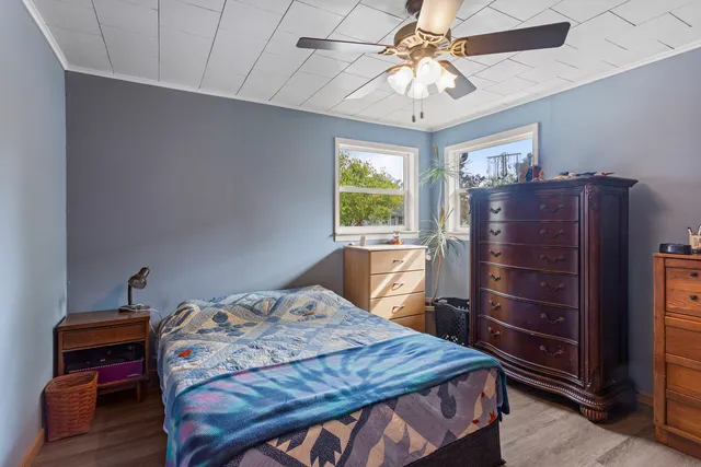 a bedroom with a bed and a closet