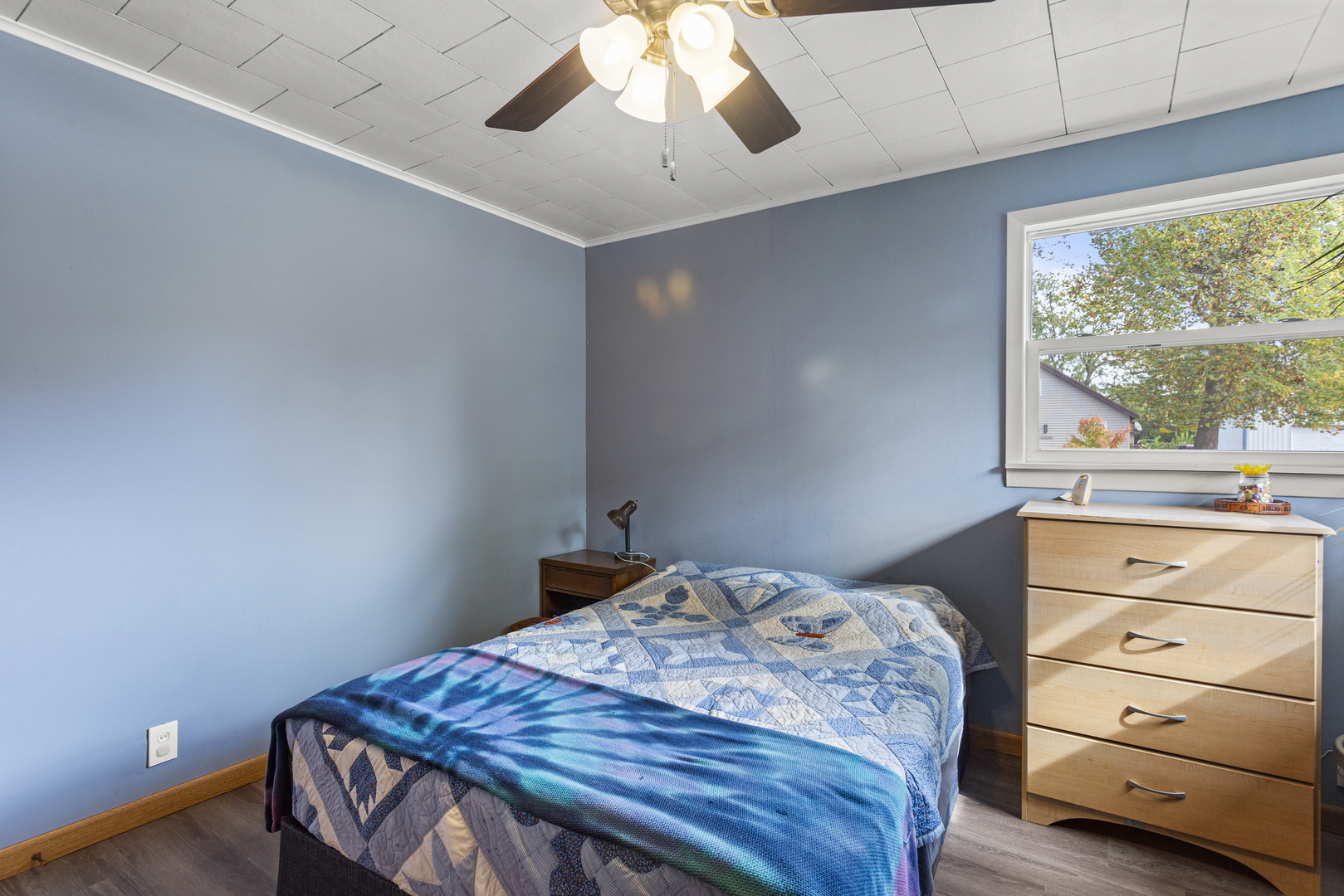13 Willow Street Dewey, IL 61840 - Photo 21 of 27 a bedroom with a bed and a window