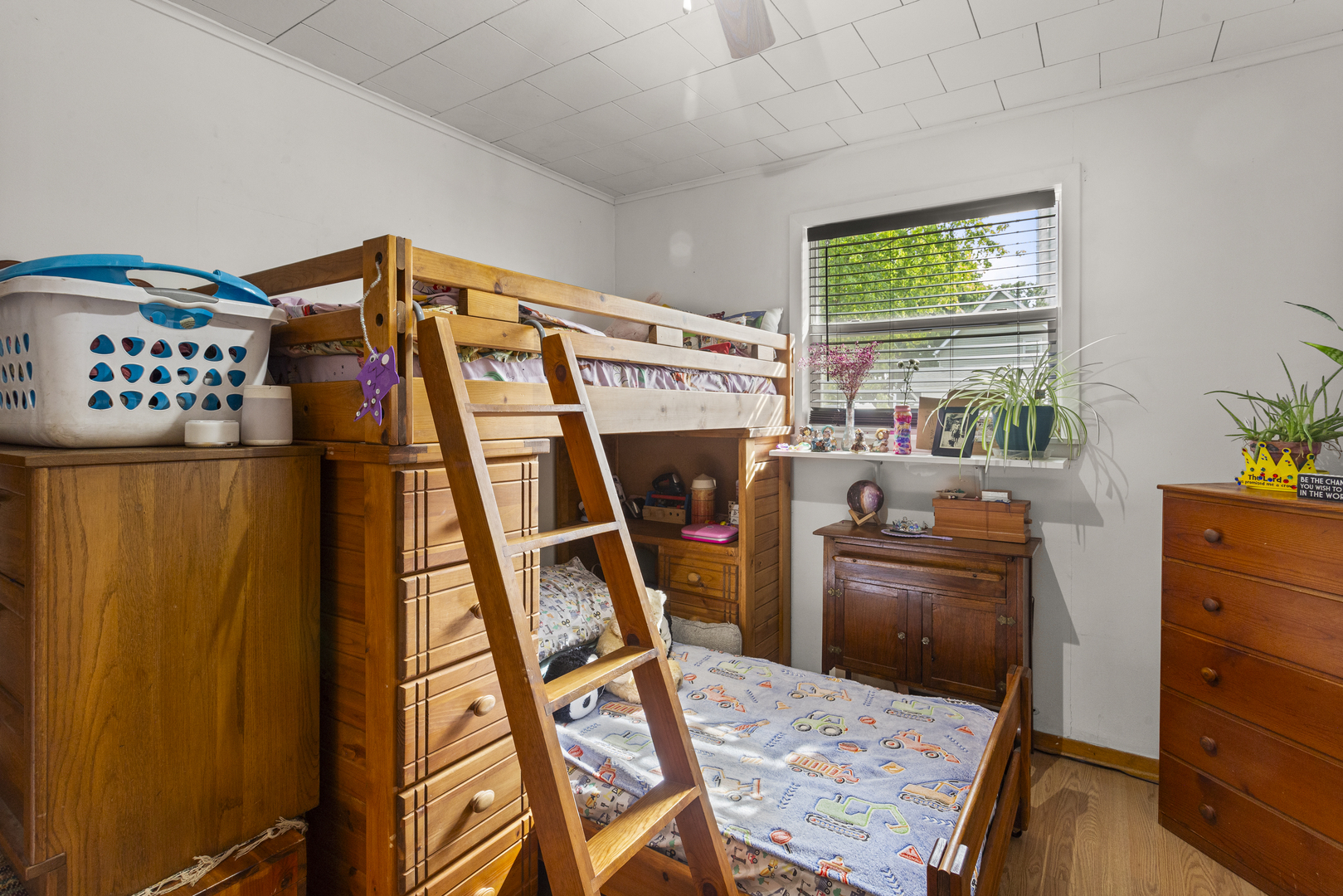 13 Willow Street Dewey, IL 61840 - Photo 22 of 27 a bed room with furniture and a window