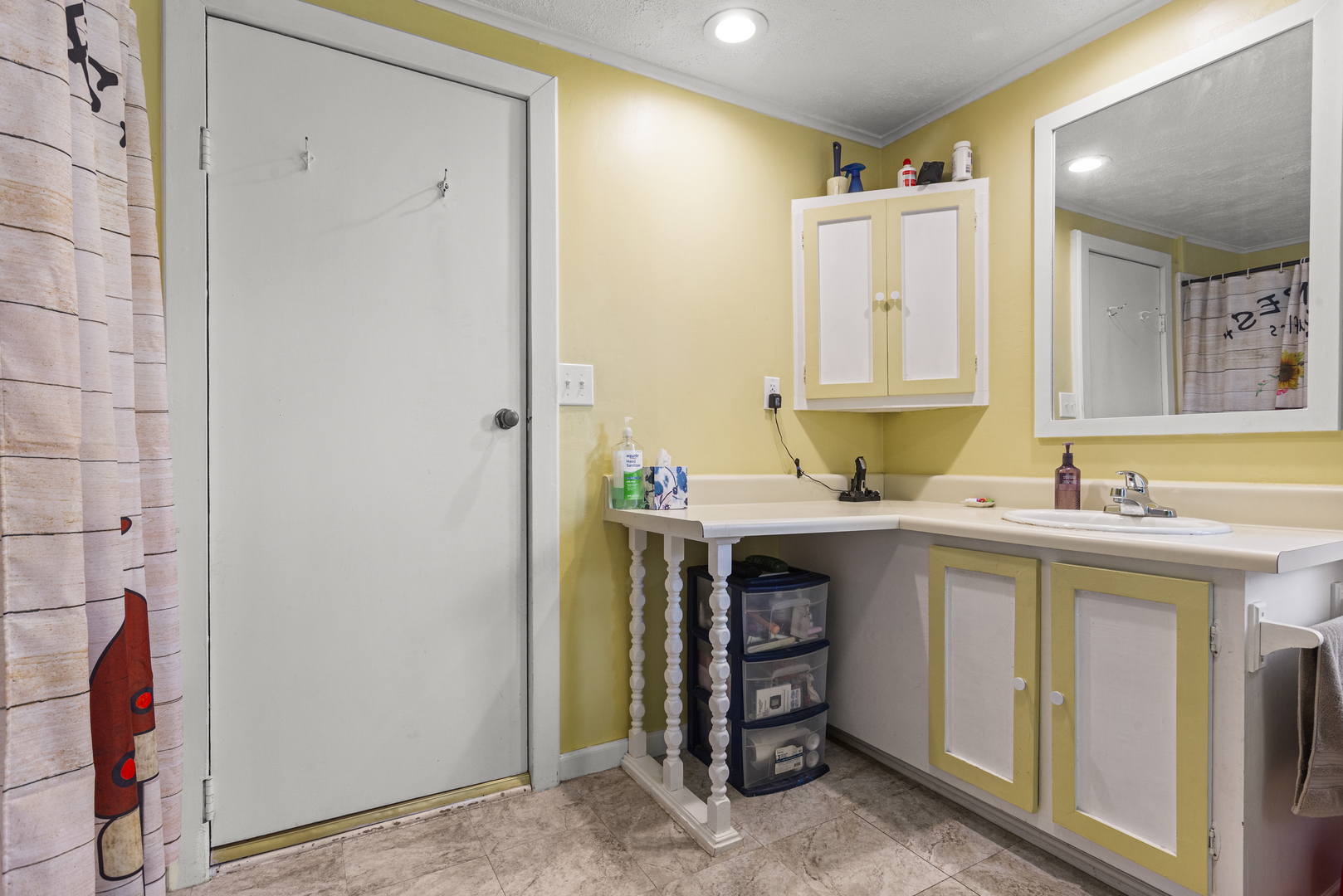 13 Willow Street Dewey, IL 61840 - Photo 25 of 27 a kitchen with a sink cabinets and a stove