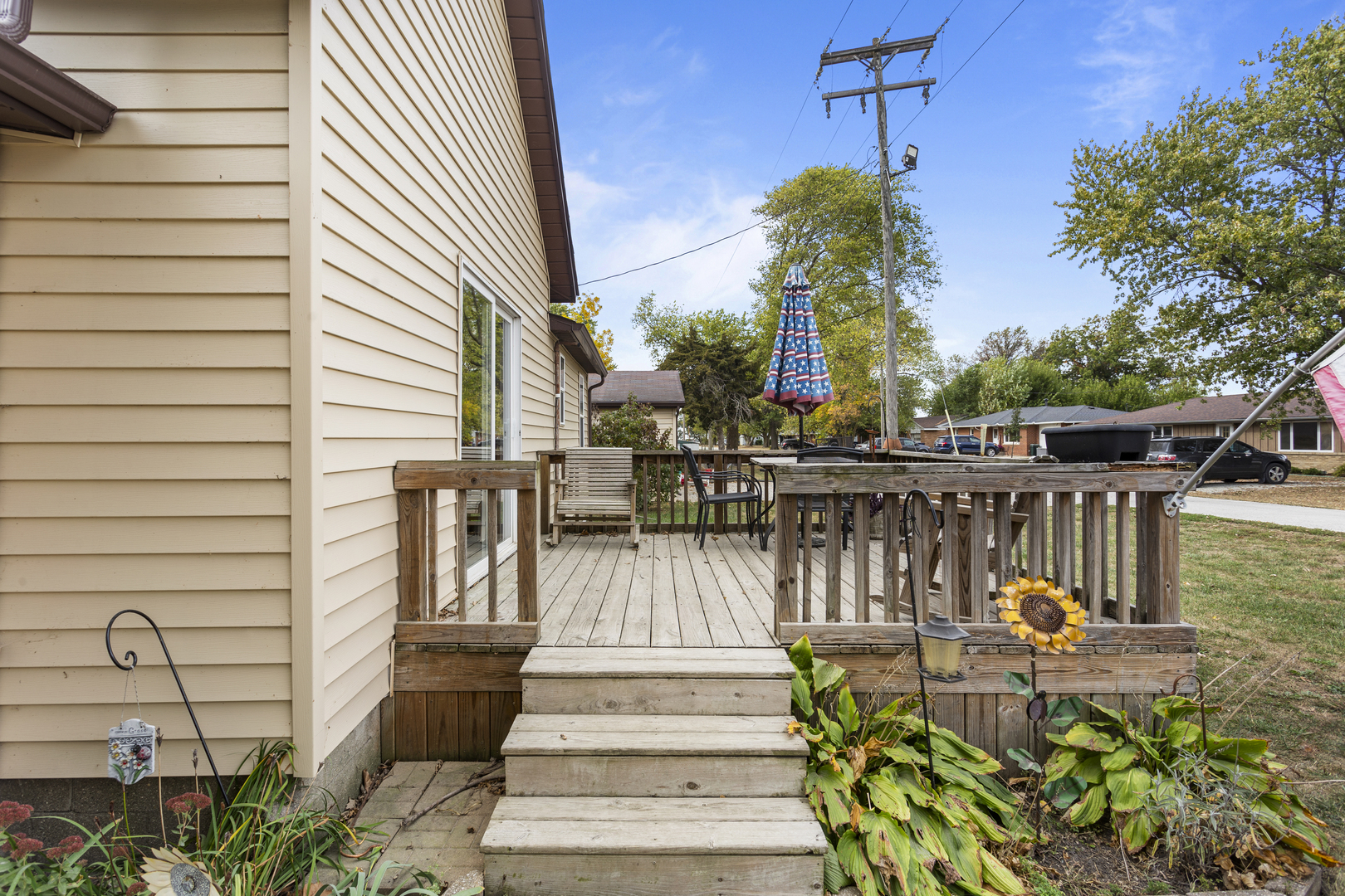 13 Willow Street Dewey, IL 61840 - Photo 6 of 27 a view of a patio with couches chairs and potted plants