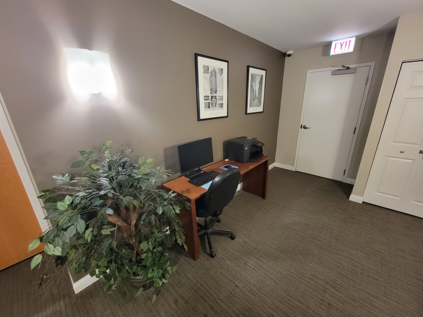 8 West Monroe Street, Unit 1508 Chicago, IL 60603 - Photo 22 of 25 a workspace with furniture and a window