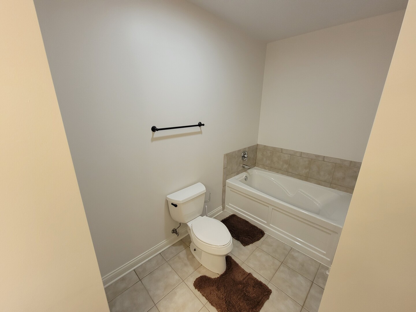 8 West Monroe Street, Unit 1508 Chicago, IL 60603 - Photo 8 of 25 a white toilet sitting next to a bath tub