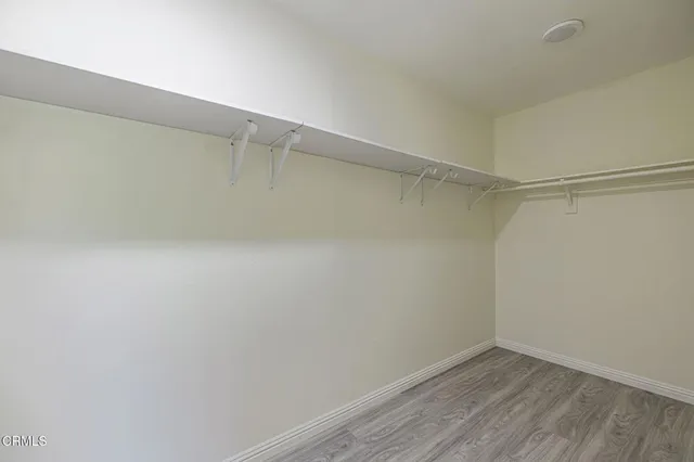 a bathroom with a double vanity sink mirror and