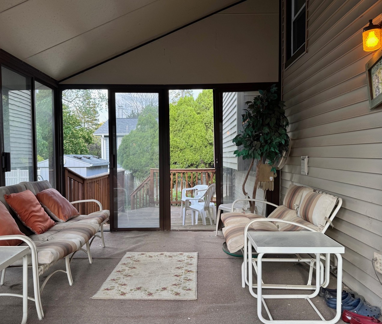 416 Trinity Court Buffalo Grove, IL 60089 - Photo 17 of 87 a outdoor living space with furniture and a potted plant