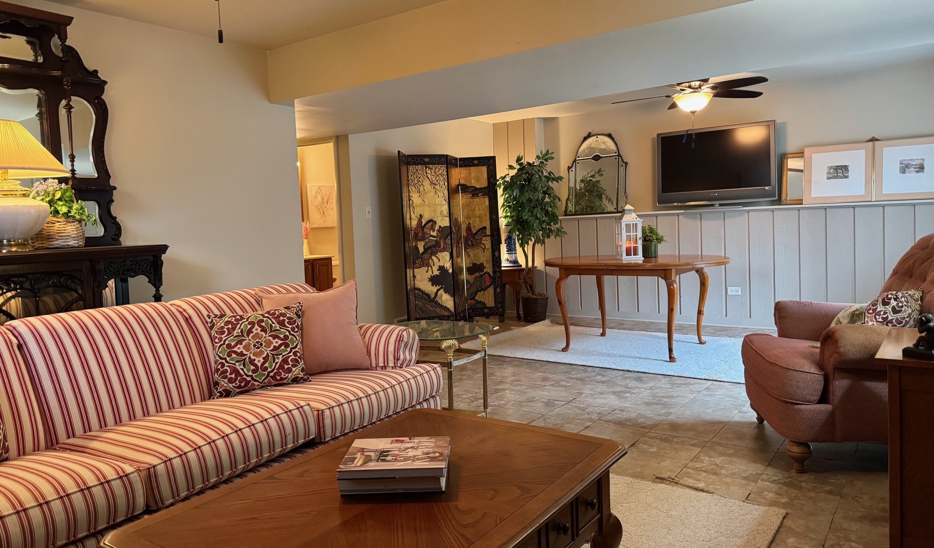 416 Trinity Court Buffalo Grove, IL 60089 - Photo 29 of 87 a living room with furniture and a flat screen tv