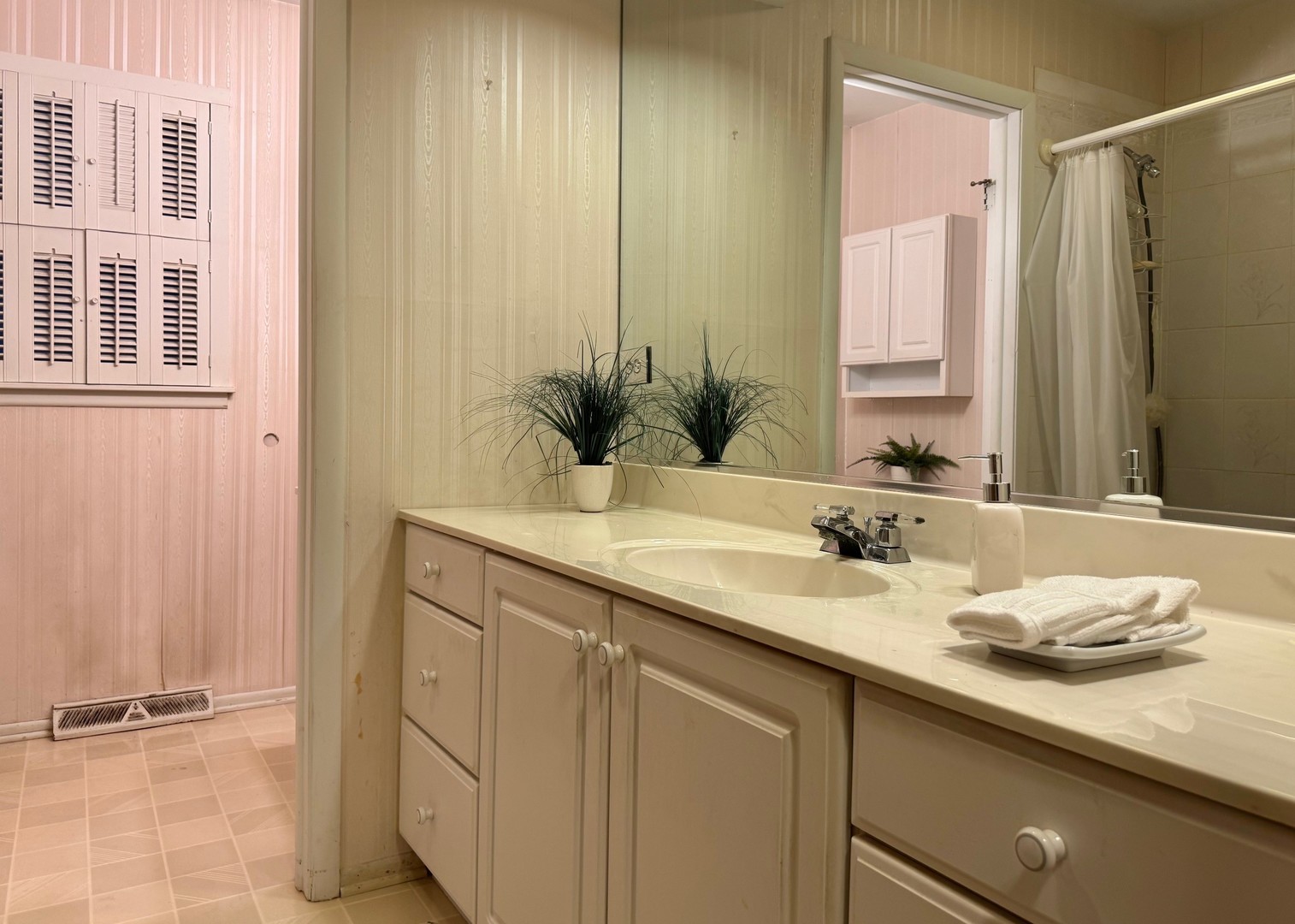 416 Trinity Court Buffalo Grove, IL 60089 - Photo 65 of 87 a bathroom with a granite countertop sink and a mirror