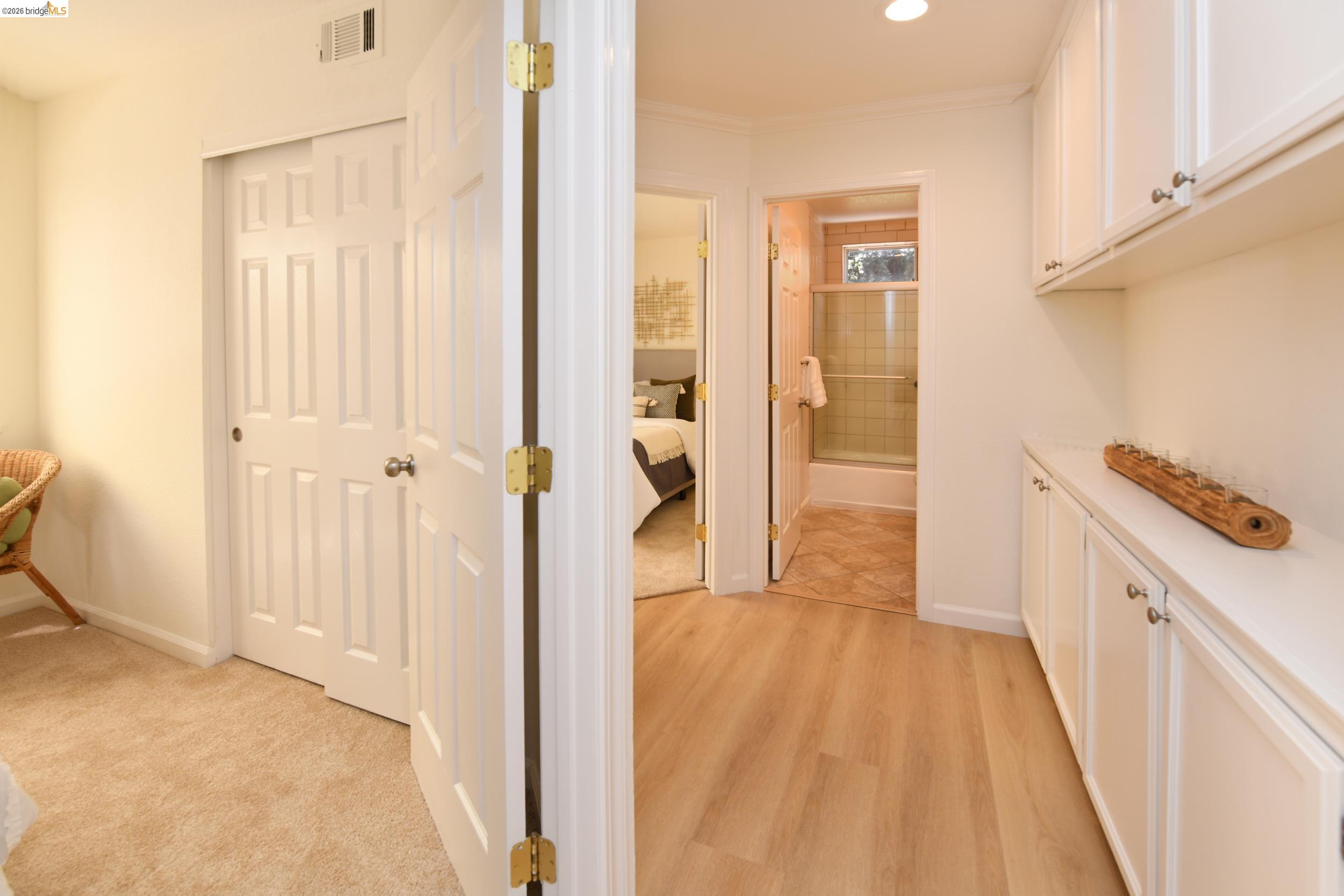 512 Burdick Drive Bay Point, CA 94565 - Photo 29 of 50 Built-in cabinetry with white shaker-style doors and chrome hardware