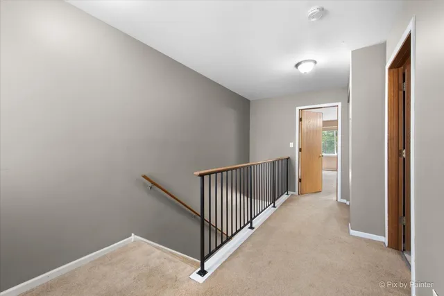 a view of a hallway with entryway