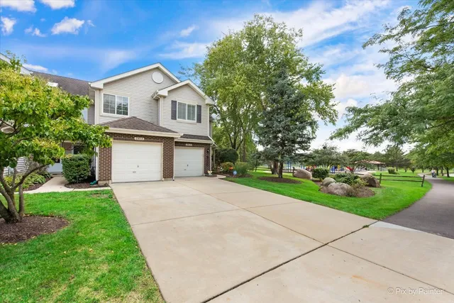 a view of house and outdoor space with yard