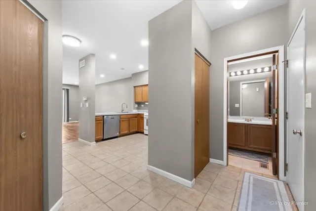 a view of a hallway with a living room