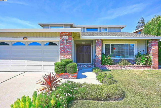 a front view of a house with patio
