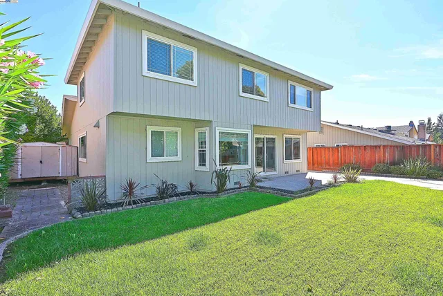 a view of a backyard with a garden
