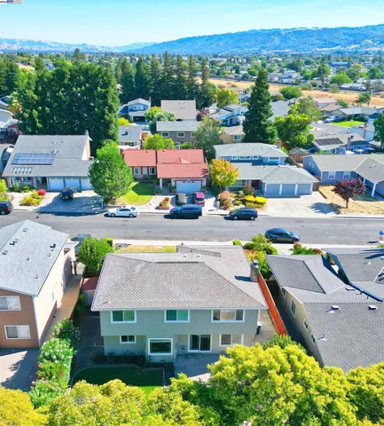 an aerial view of a house with a garden