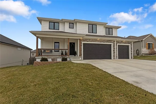 $515,000 | 601 Southwest Meadowood Drive, Grain Valley, MO 64029