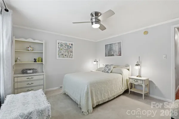 a bedroom with a bed and a cabinets