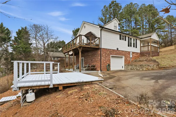 a house with trees in the background